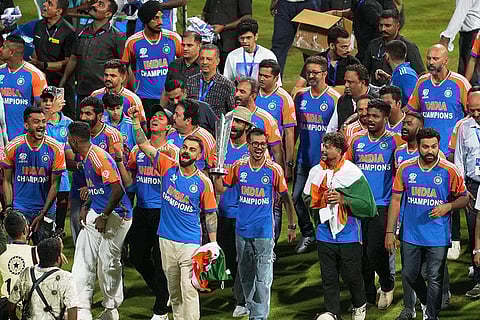 Indian cricket team take a victory lap at the Wankhede Stadium